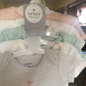 New with tags 5 piece bodysuits